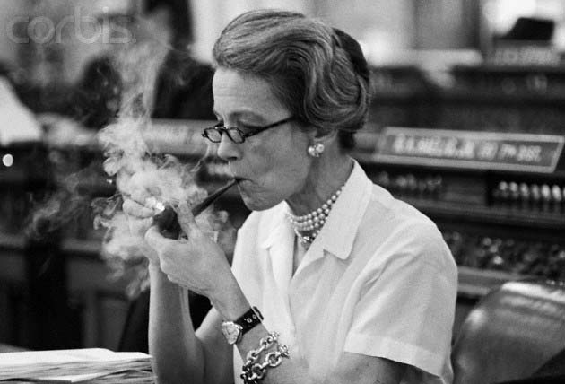 Millicent and Congress smoking a pipe