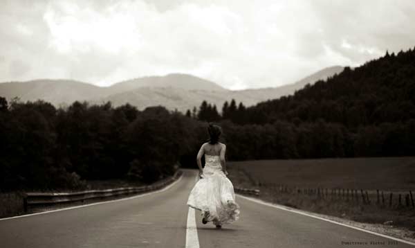 Bride running in trainers