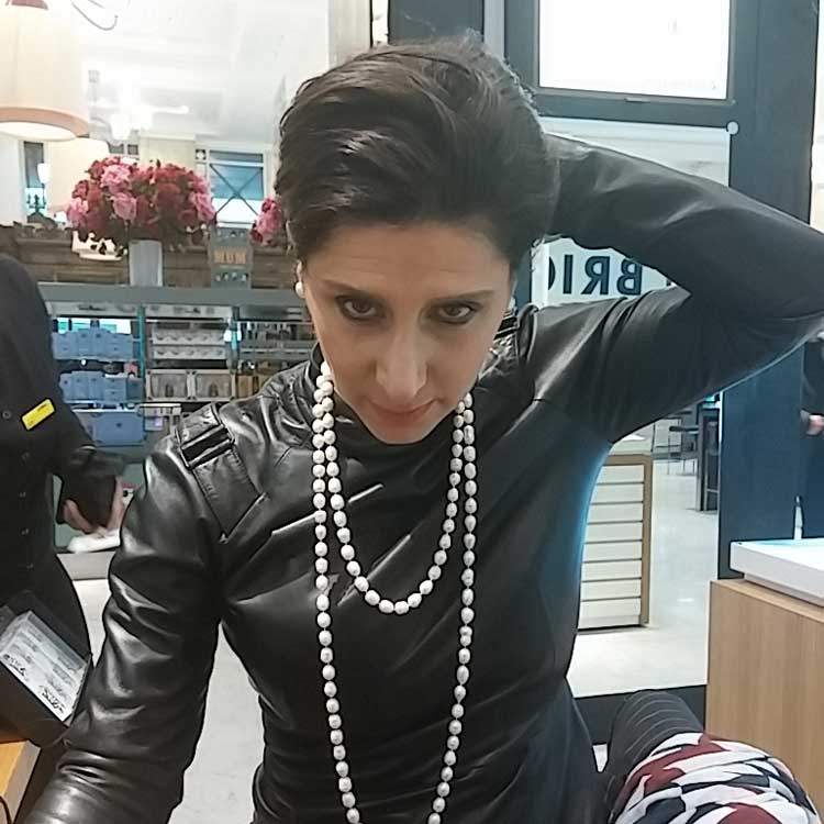 gracie-opulanza-wearing-black-leather-dress