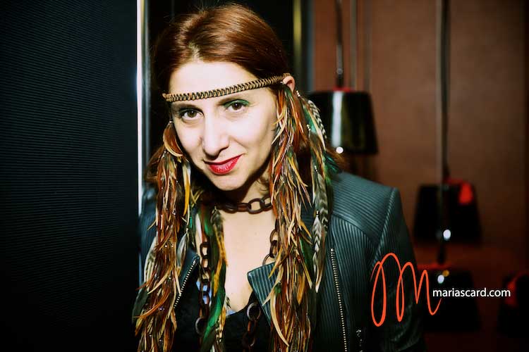 Gracie Opulanza peacock feathers