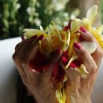 Treat Yourself to a Flower Bath Next to a Waterfall