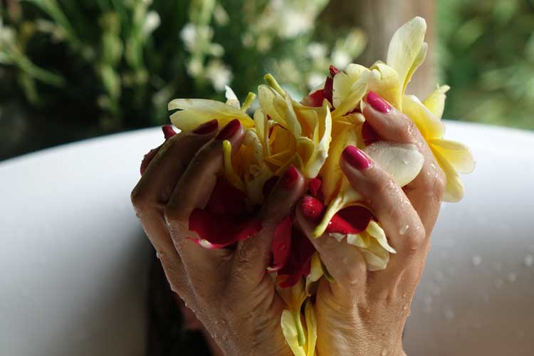 Treat Yourself to a Flower Bath Next to a Waterfall