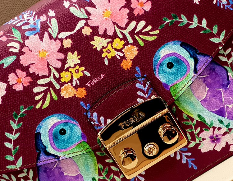 Furls owl leather bag