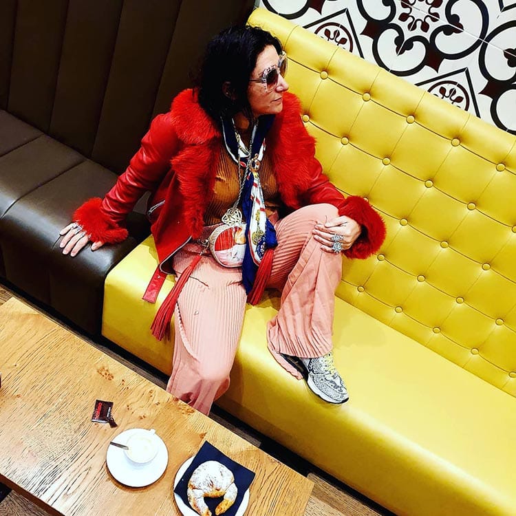 It matched the spice red seat belt of the Aston Martin DB11.