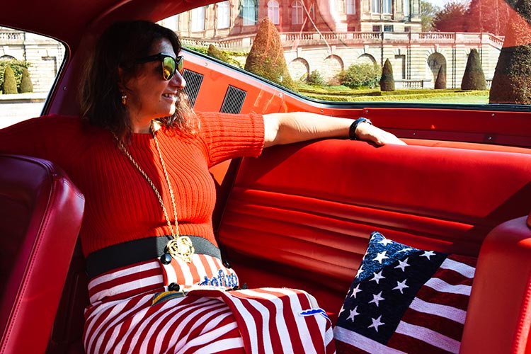 Gracie Opulanza wearing Dolce gabbana skirt in a vintage mustang (1)