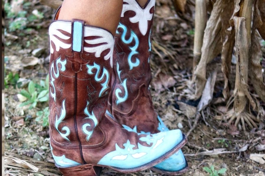 cowboy boots with cable knit leggings