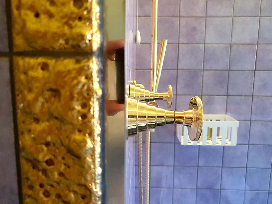 purple and gold bathroom