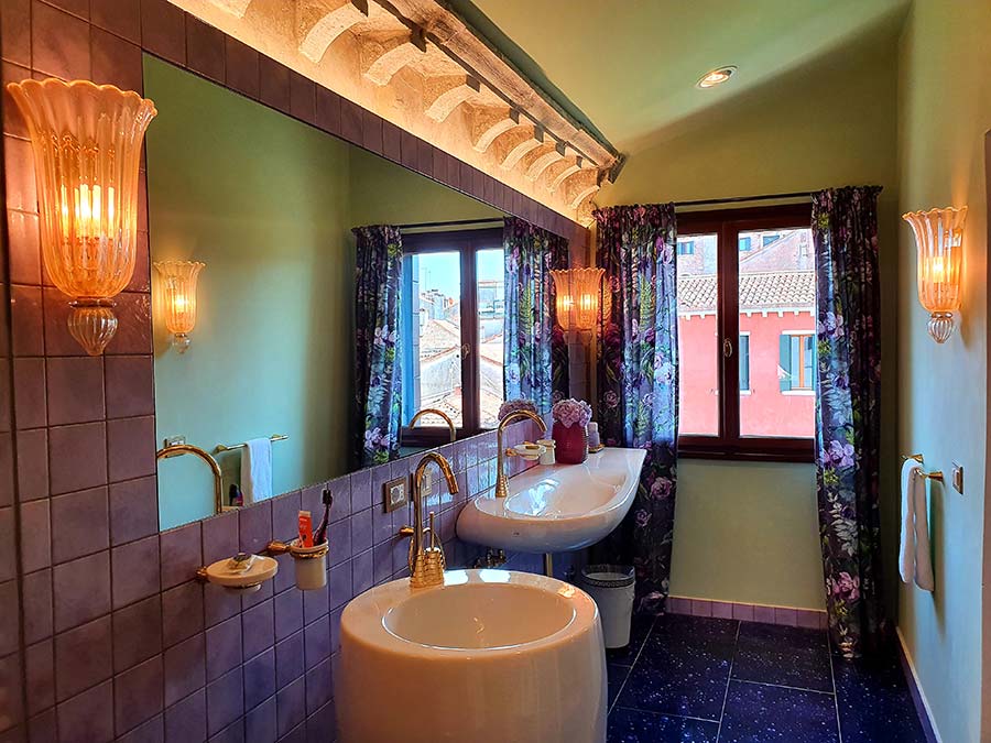 purple and gold bathroom