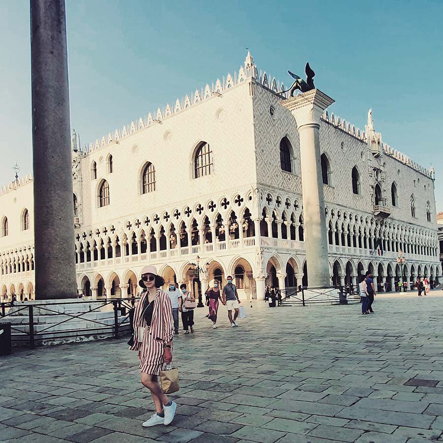 Venice street style striped suit for women Piazza San Marco ITaly