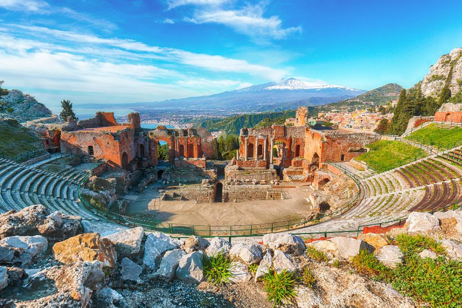 Taormina Roman Theatre with the Etna volcano in the background.