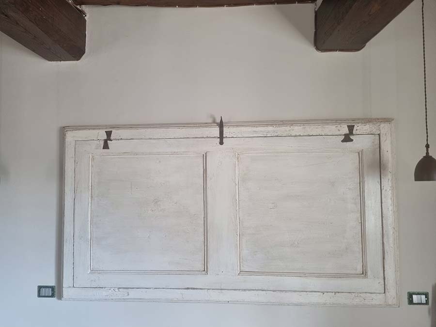 Turning Wooden Antique Doors into Luxurious Bed Heads