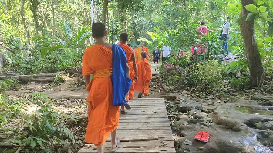 Laos Waterfalls - Indulgence in Nature's Opulent Playground monks