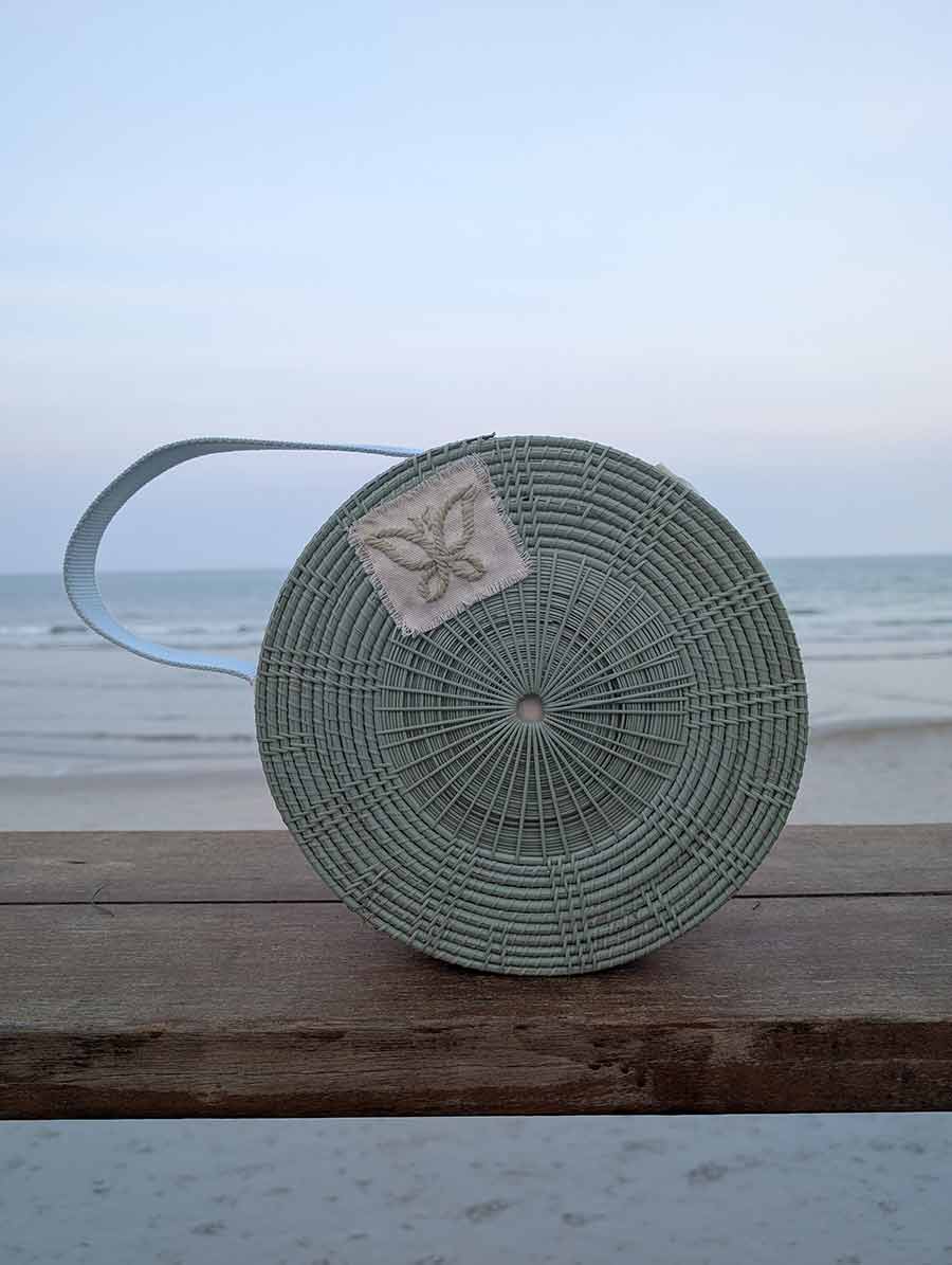 rattan-bag-gracie-opulanza-the-white-lotus-resort-wear