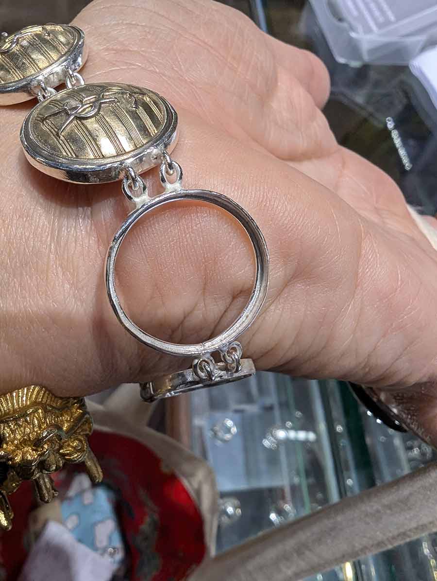 YSL-buttons-into-a-bracelet-Gracie-Opulanza.jpg-bespoke