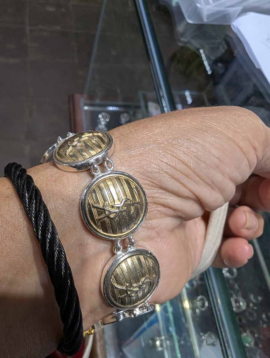 YSL-buttons-into-a-bracelet-Gracie-Opulanza.jpg-silver-gold-plated